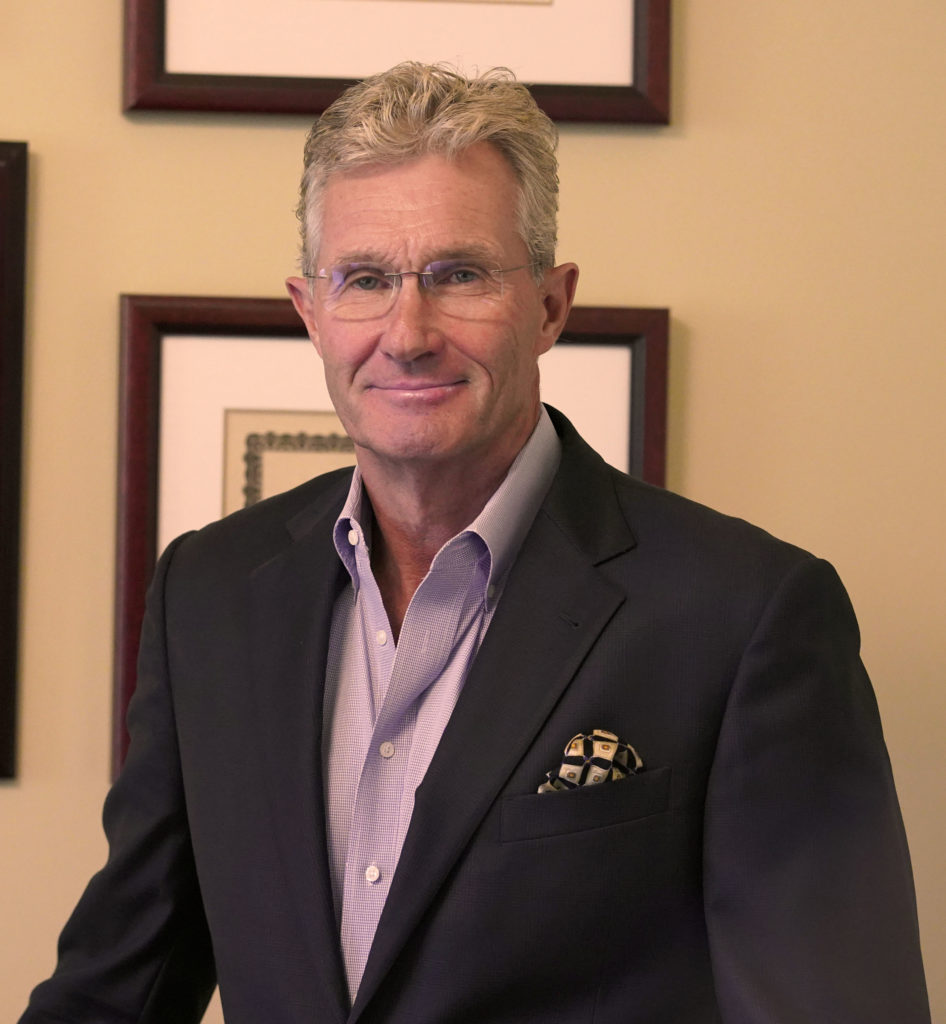 Portrait of CEO and Founder of Neurovations Dr. Eric Grigsby